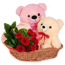 2 teddy bears (6 inches each) with 8 red roses in same basket