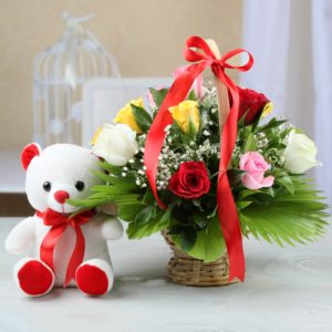 Teddy bear (6 inches) with 12 Mix roses in a Basket