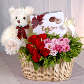 Chocolates, Roses flowers basket, Teddy and rakhi