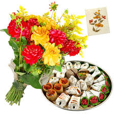 250 gm Kaju Roll and bouquet of Mixed color roses and a Greeting card