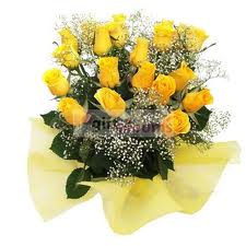 12 yellow roses in a basket
