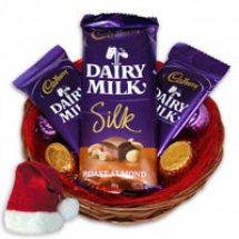 3 Cadburys Silk chocolates in a basket