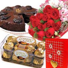 Flowers and chocolates with cake and rakhi